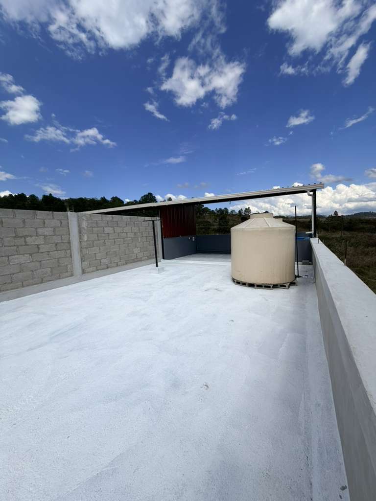 Terraza con área de lavandería